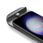 Samsung Galaxy Power Bank Charger Case 2 | PricZone Close up of a sleek charging dock attached to a smartphone with blue status LEDs glowing on the dock edge | PricZone