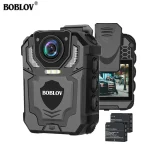 Boblov T5 Body Worn Full Hd 128Gb Dvr Security Camera 1 | PricZone BOBLOV body worn camera with front lens LED lights and a detachable LCD screen showing a street scene plus two batteries at bottom right | PricZone