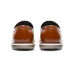 Pair of brown leather loafers viewed from the back on a white background with visible stitching and soles | PricZone