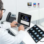5 Inch Portable Monitor for Mac Xbox Ps45 Switch 4 | PricZone Clinician at a desk using a laptop that displays medical imaging a tilted monitor shows MRI brain scans | PricZone