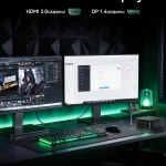 Dual 4K monitor setup on a dark desk with green LED lighting keyboard mouse and small figurines beside a glass lit jar lamp | PricZone