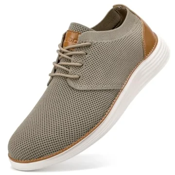 Gray mesh sneaker with a brown leather heel patch and white sole laced up for wearing | PricZone