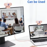 1080P Hd Webcam for PC Laptop Desktop Mac with Microphone 5 | PricZone Desk setup with a large monitor and a laptop showing a group video conference pink webcams mounted on top of each screen Intended to show PC and laptop compatibility with the webcam accessory | PricZone