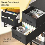 Two black fabric storage drawers pulled out from a desk showing folders papers and headphones inside Caption reads Two fabric storage drawers at the bottom left | PricZone
