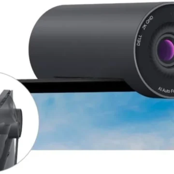 External webcam mounted on top of a monitor, labeled AI Auto Framing, with a circular inset showing the mount.)