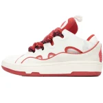 White sneaker with red accents side view showing red laces and sole | PricZone