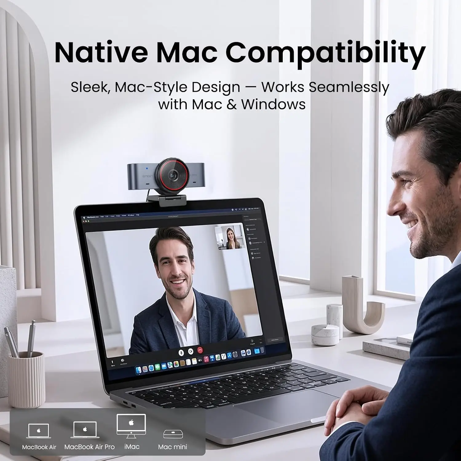 Promotional banner: highlights 'Native Mac Compatibility' while a man video chats on a MacBook with an external webcam mounted on top in a bright office setting.