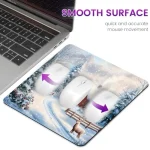 Winter themed mouse pad on a laptop promoting a smooth surface for quick and accurate mouse movement | PricZone