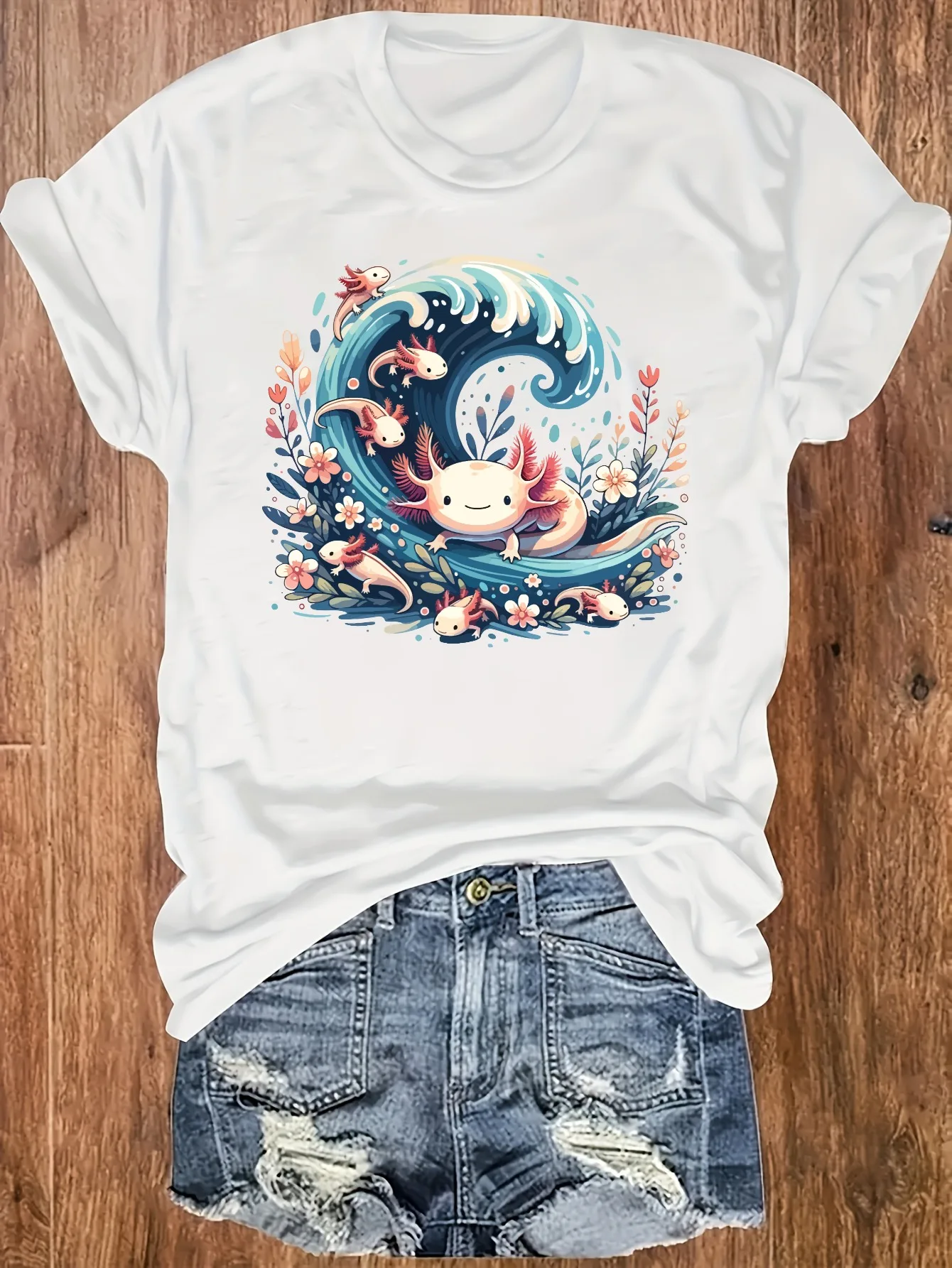 Womens Plus Size Axolotl Wave Tank Top 5 | PricZone White T shirt featuring a whimsical design of a blue curling wave with smiling pink axolotl like creatures among flowers | PricZone