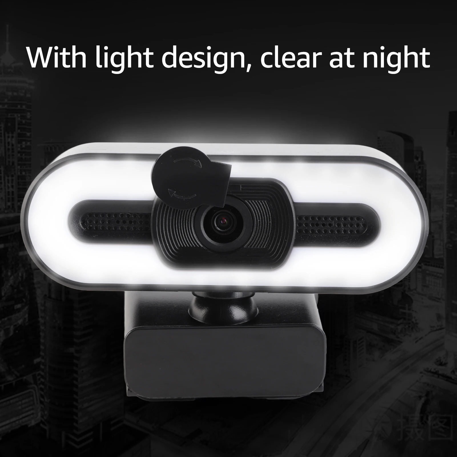 Close-up of a dash camera with a bright ring light against a dark city night background.