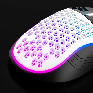 RGB gaming mouse with a perforated honeycomb shell and purple-blue lighting on a dark surface.