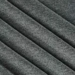 Close up of folded dark gray knit fabric with a soft textured surface | PricZone