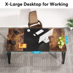 Overhead view of a large wooden desk with keyboard monitor lamp coffee cup and plant width 7087 in and depth 3150 in | PricZone