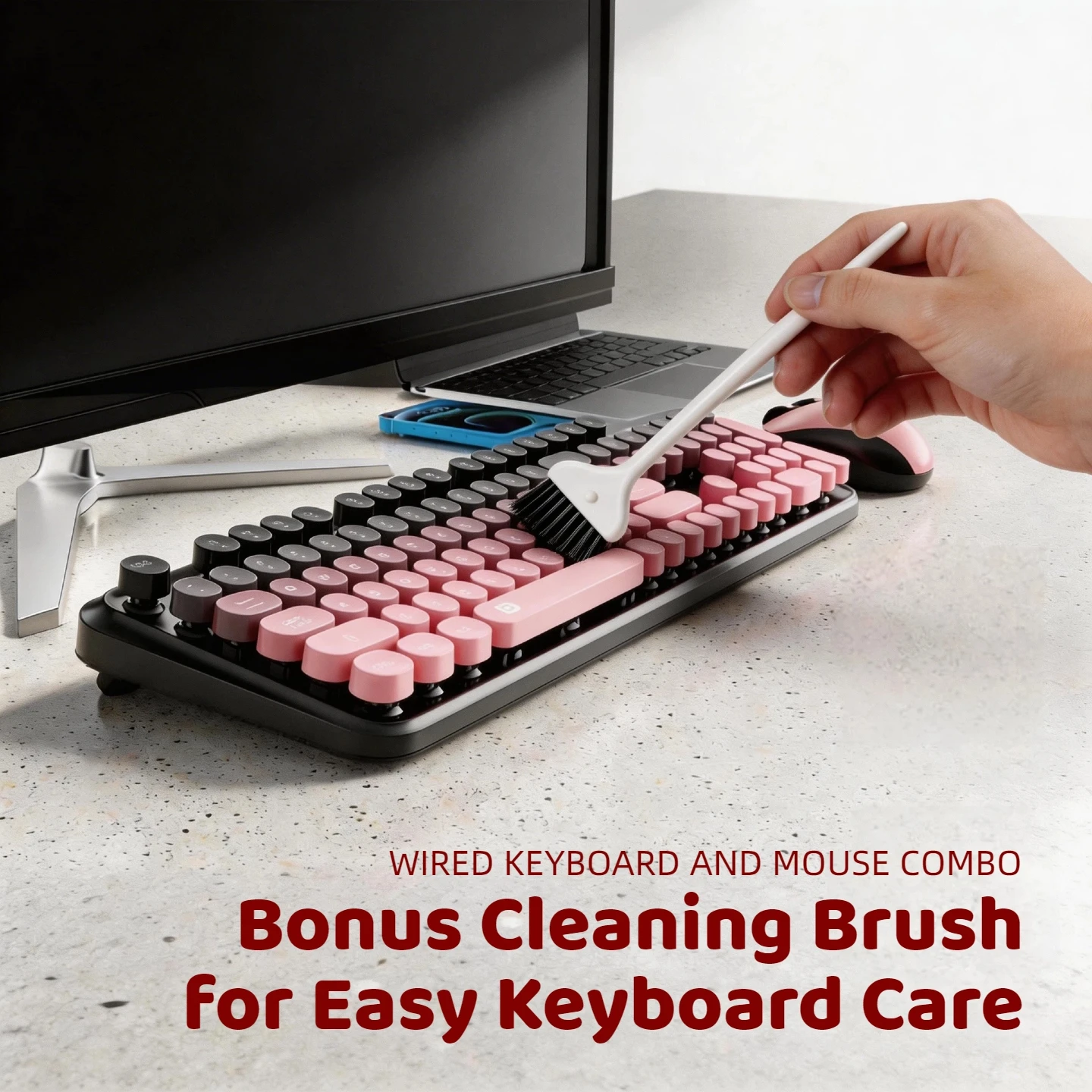 Hand brushing dust from a pink wired keyboard with a white cleaning brush; caption reads 'Bonus Cleaning Brush for Easy Keyboard Care'.