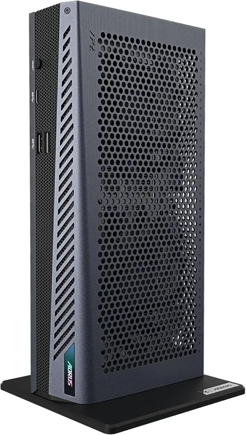 Front view of a black, tall computer tower with perforated honeycomb ventilation, placed on a black stand; USB ports and power button visible, AORUS logo at base.