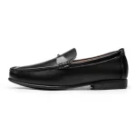Black leather loafer with a rounded toe and low heel shown in profile | PricZone