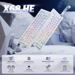 Attack Shark X68 He Rapid Trigger Mechanical Gaming 1 | PricZone White mechanical keyboard with RGB lighting angled on icy rocks showcasing a rugged futuristic setup | PricZone