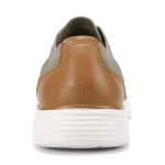 Back view of a brown leather heel and gray fabric sneaker with a thick white sole | PricZone