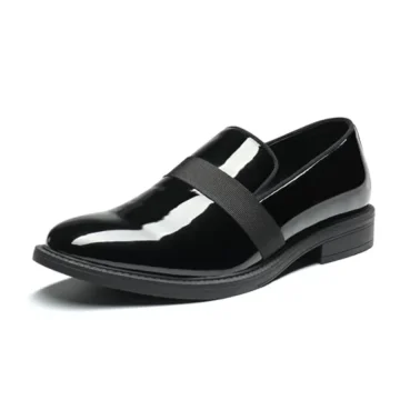 Black patent leather loafer with a single elastic strap across the top and a low block heel, shown in a side view.