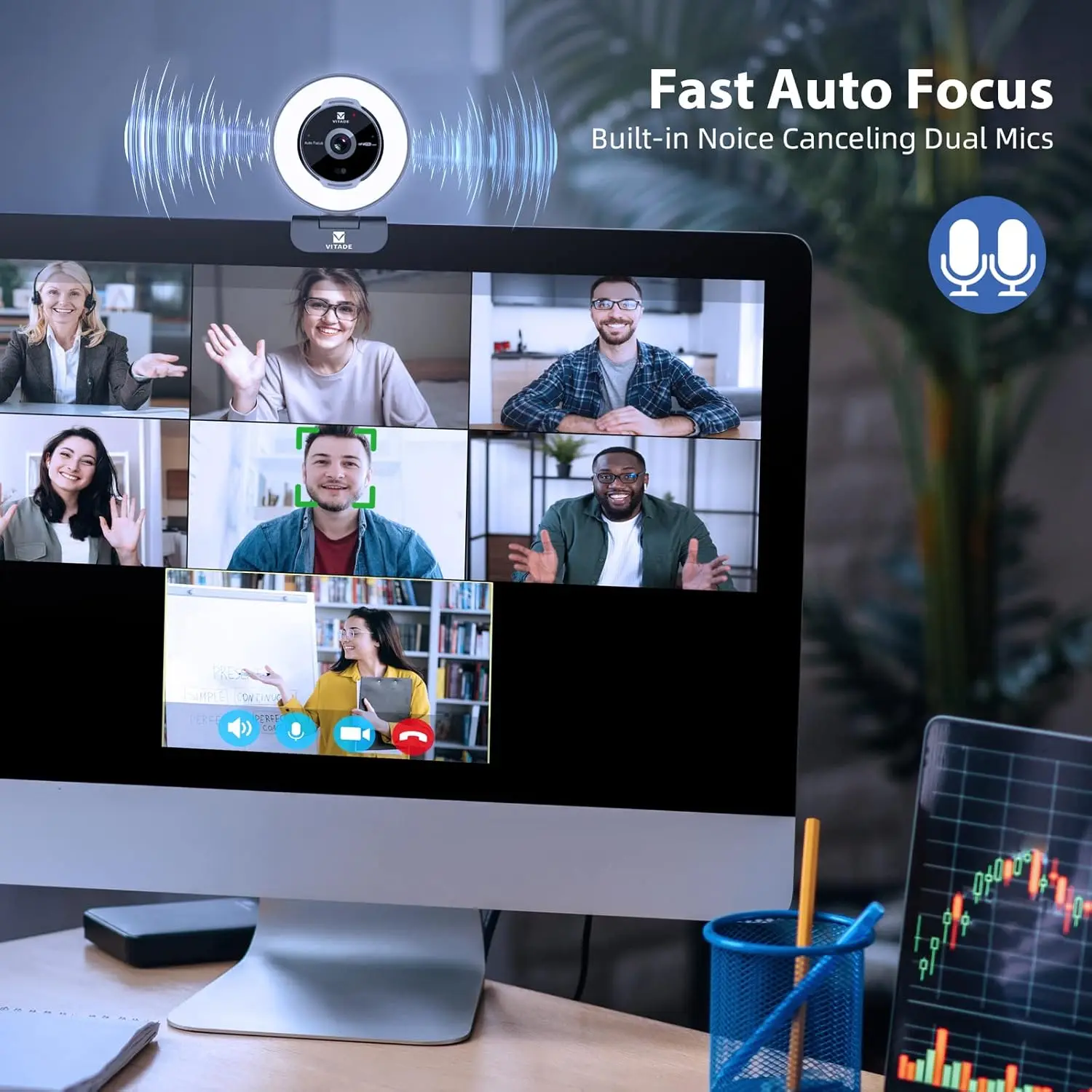 Monitor shows a multi-person video call in grid layout; a round webcam sits atop and a blue mic icon appears next to the 'Fast Auto Focus' text.