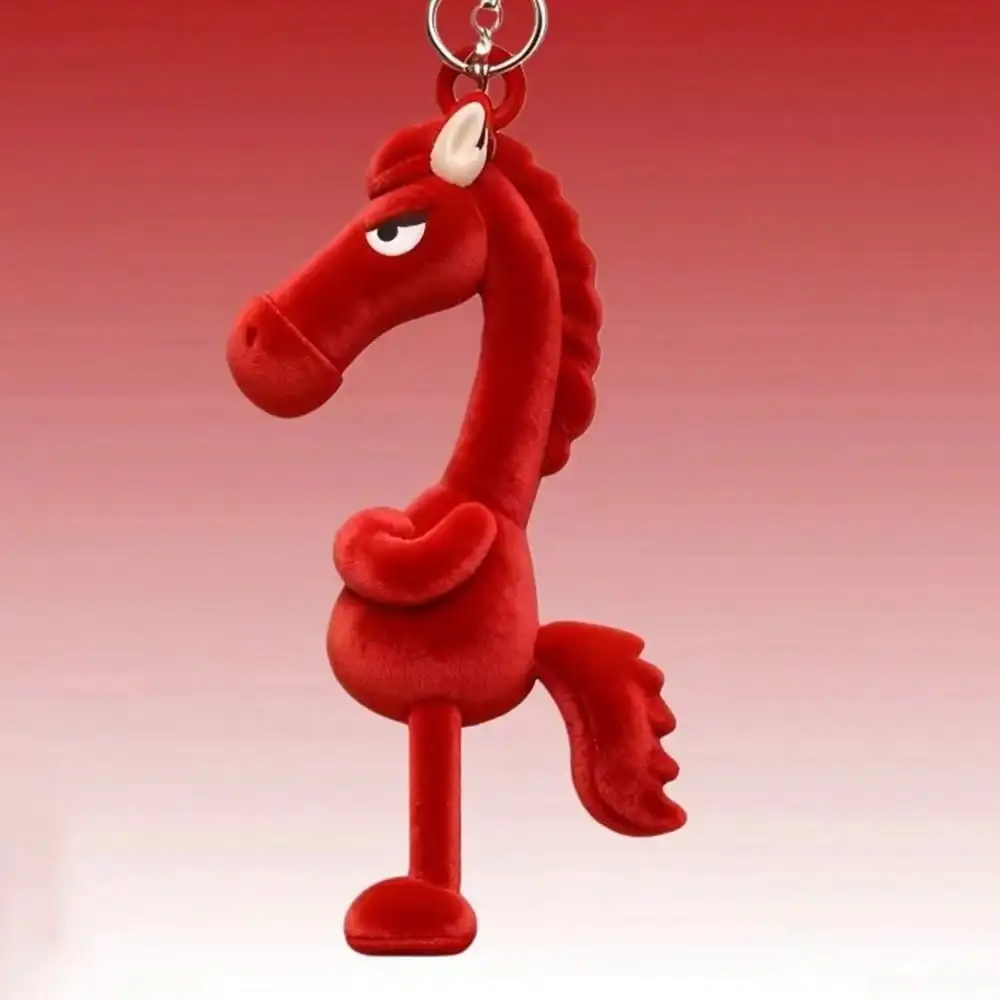 Premium Plush Red Pony Car Keychain Purse Charm 1 | PricZone Red plush cartoon horse keychain with a long neck suspended from a metal ring and gradient red background | PricZone