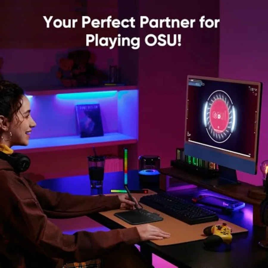 Person using a graphic tablet at a neon-lit desk while playing osu!; monitor shows a circular UI on screen; bold overlay text reads 'Your Perfect Partner for Playing osu!'