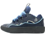 Blue and navy sneaker with a thick black sole and light blue trim viewed from the side | PricZone