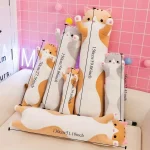 Tall orange and white cat plush cushions arranged on a pink sofa with measurement lines showing heights from 50 cm to 130 cm | PricZone
