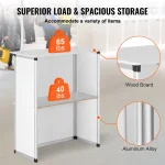 Portable Tradeshow Counter Display Table 3 | PricZone Three tier metal storage display with orange weight tags reading 65 lbs and 40 lbs highlighting a wood top panel and aluminum alloy frame against a blurred showroom background | PricZone