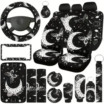 Car interior accessory set in black with white moon and butterfly celestial print (steering wheel cover, seat covers, mats, and more).